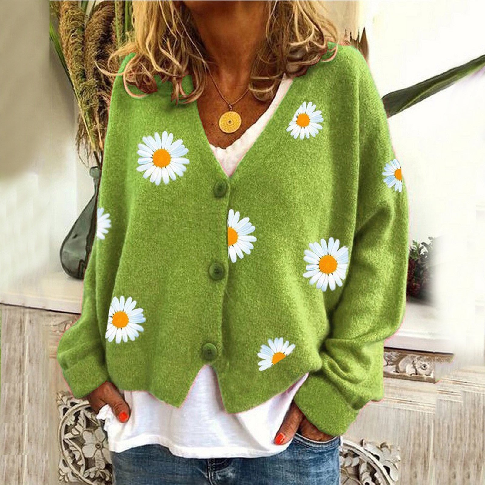 Gebreide trui met bloemen