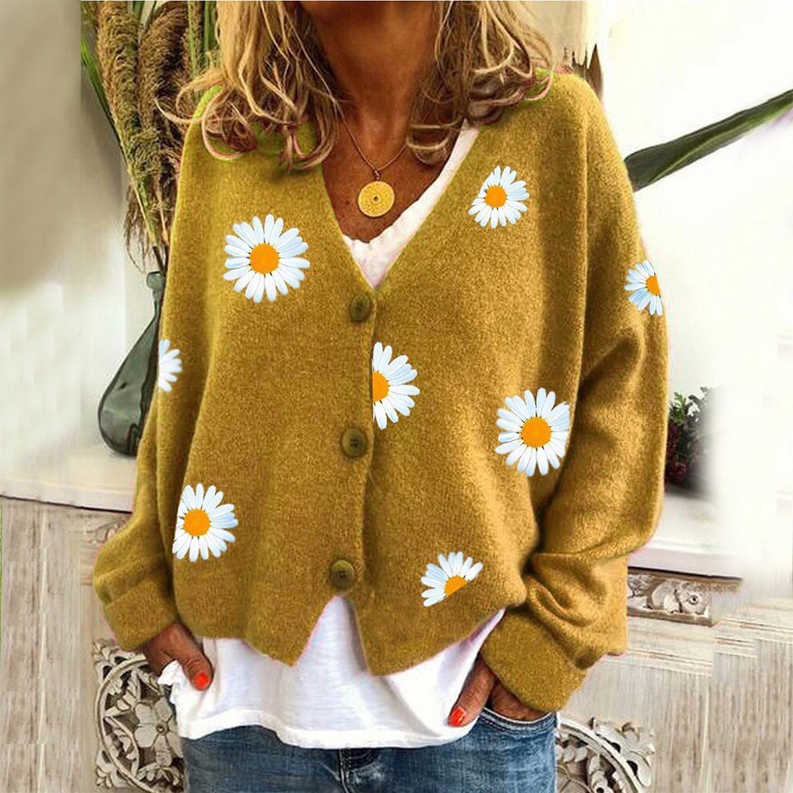 Gebreide trui met bloemen